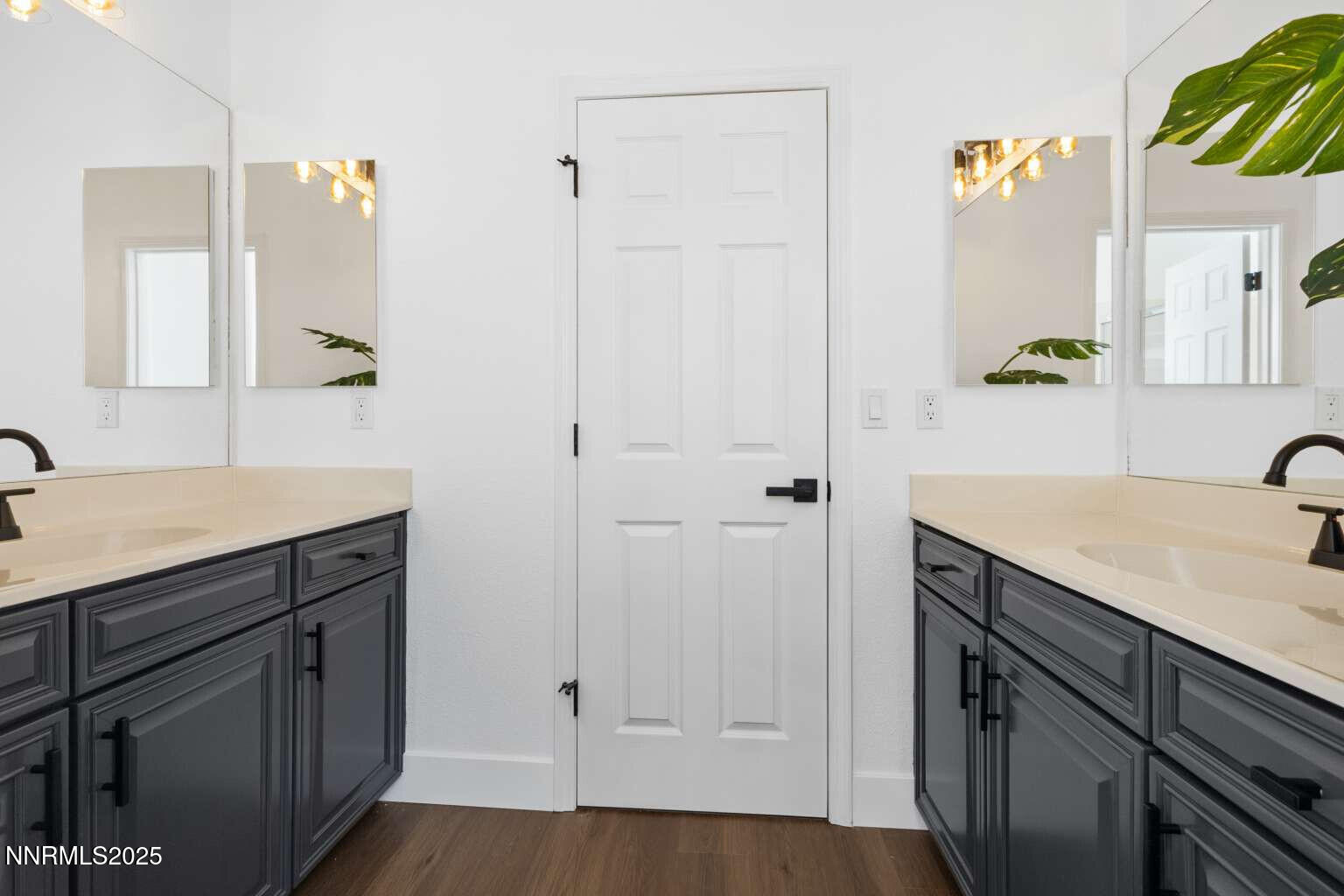 11020 Colton Drive Reno, NV 89521 - Photo 19 of 30 a bathroom with a sink and a mirror