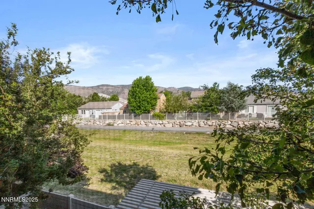 a view of a swimming pool with an ocean view