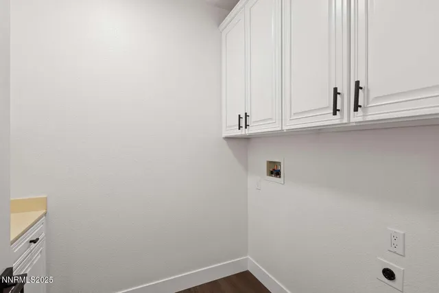 a view of cabinets and window