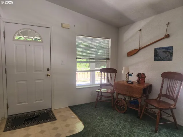 a workspace with furniture and window