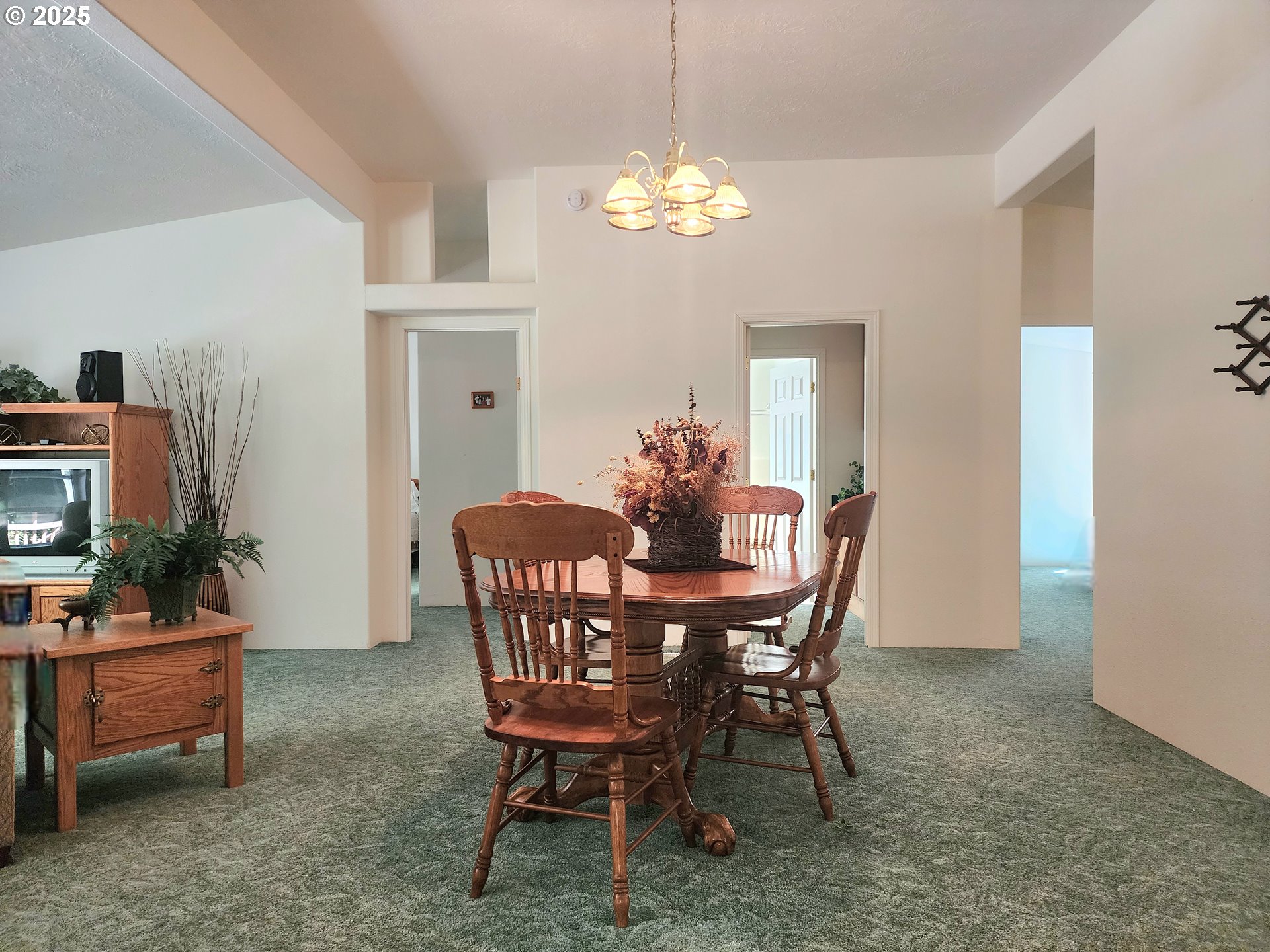 2647 South Tenmile Lakeside, OR 97449 - Photo 22 of 47 a dining room with furniture and chandelier