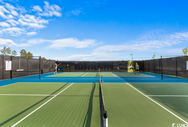 2134 Gooseberry Way Longs, SC 29568 - Photo 7 of 9 View of tennis court featuring community basketball court