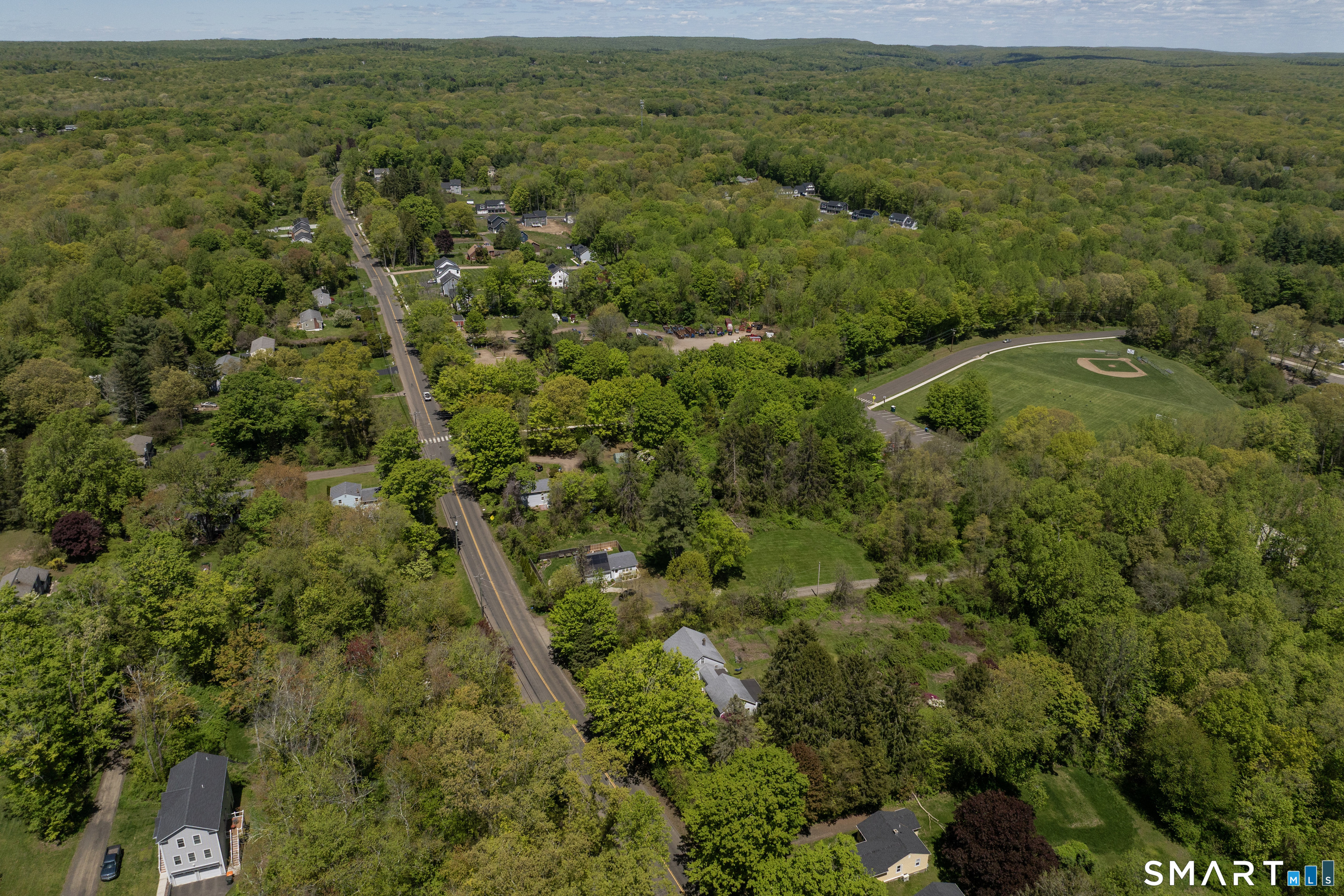 1973 Long Hill Road Guilford, CT 06437 - Photo 4 of 19 a view of a field with an ocean
