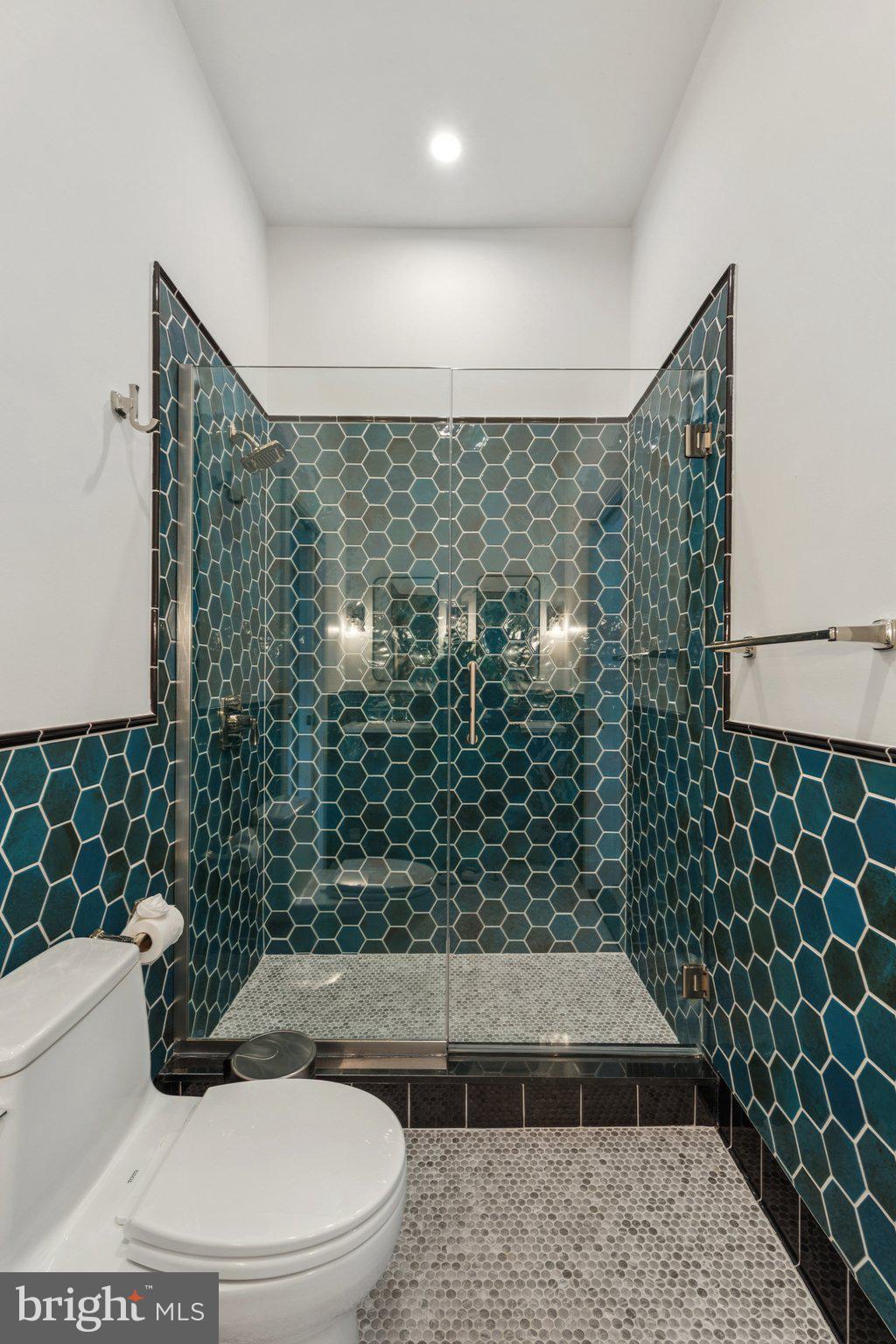 207 South 24th Street Philadelphia, PA 19103 - Photo 29 of 47 a bathroom with a toilet and a shower