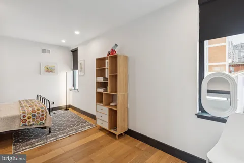 a view of livingroom with furniture and white walls