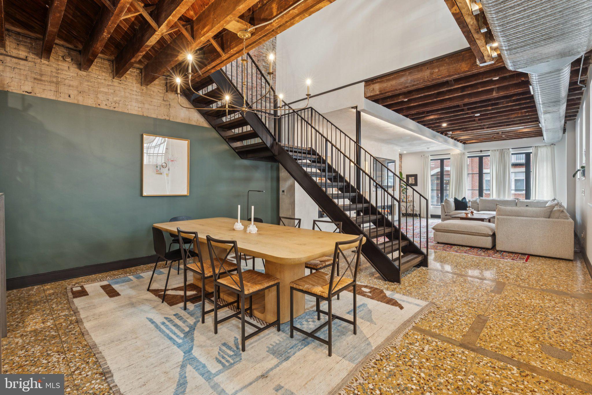 207 South 24th Street Philadelphia, PA 19103 - Photo 4 of 47 a dining room with furniture and wooden floor
