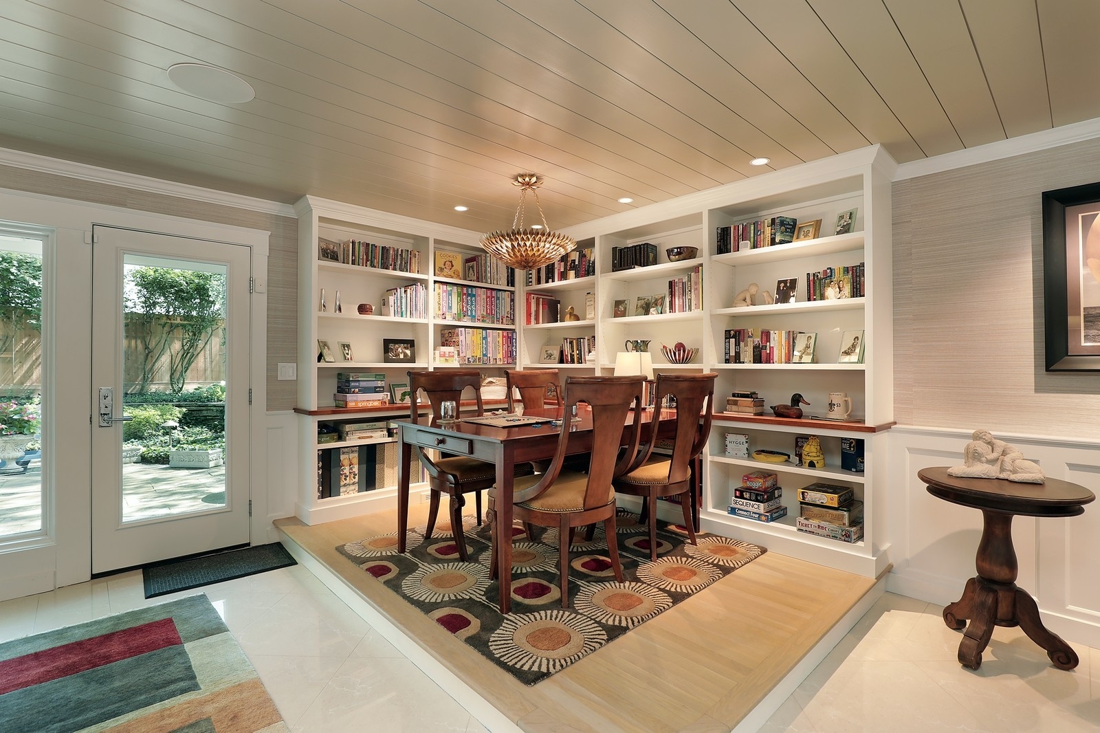 100 Beach Road Glencoe, IL 60022 - Photo 16 of 40 a view of a workspace with furniture and a potted plant