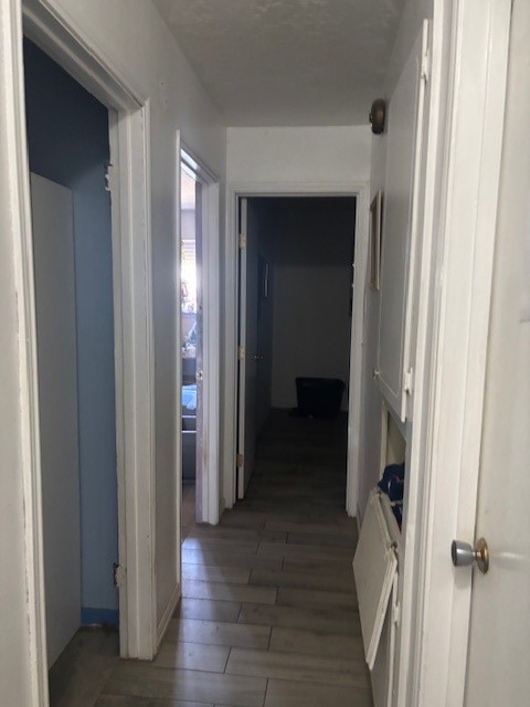 4807 Redfish Reef Drive Bacliff, TX 77518 - Photo 10 of 16 a view of a hallway with wooden floor and closet area