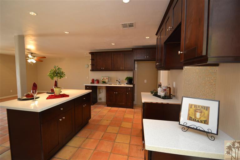 71966 Vista Del Rio Rancho Mirage, CA 92270 - Photo 5 of 23 a kitchen with a sink appliances and cabinets