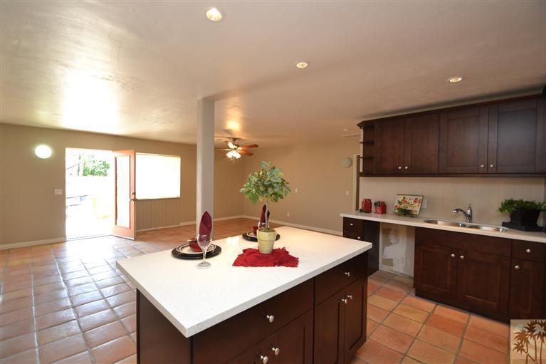 71966 Vista Del Rio Rancho Mirage, CA 92270 - Photo 6 of 23 a kitchen with a sink and cabinets