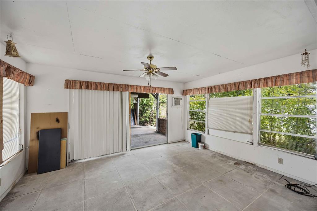 309 Base Avenue East Venice, FL 34285 - Photo 24 of 36 a view of a livingroom with furniture wooden floor and a window