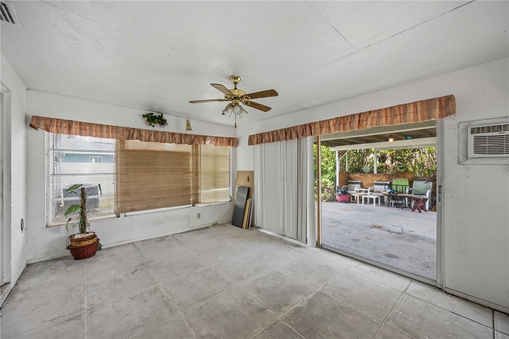 309 Base Avenue East Venice, FL 34285 - Photo 25 of 36 an empty room with windows