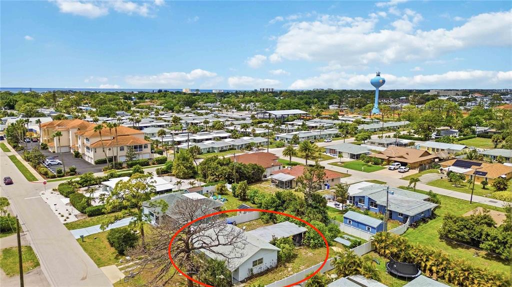 309 Base Avenue East Venice, FL 34285 - Photo 36 of 36 an aerial view of residential houses with outdoor space