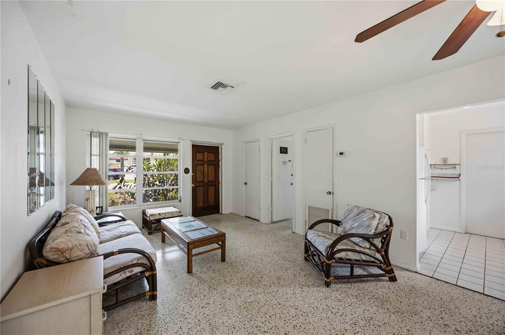 309 Base Avenue East Venice, FL 34285 - Photo 10 of 36 a living room with furniture and a large window