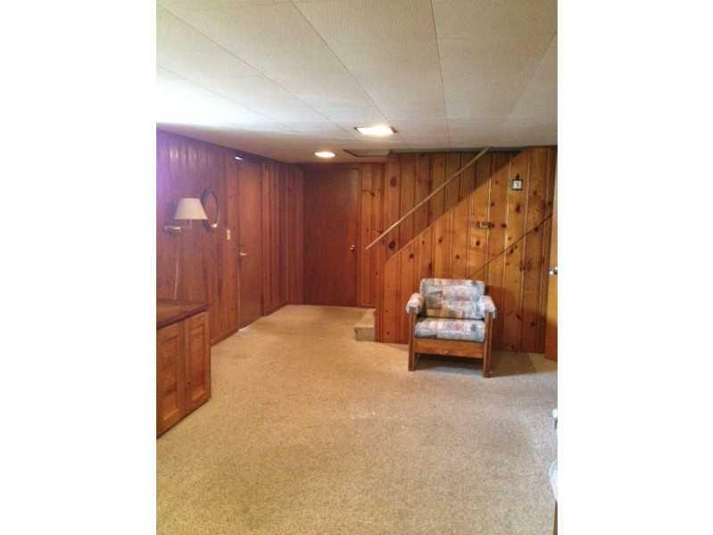 1235 Varner Road Whitehall, PA 15227 - Photo 13 of 18 Family Room. View showing steps to upstairs.