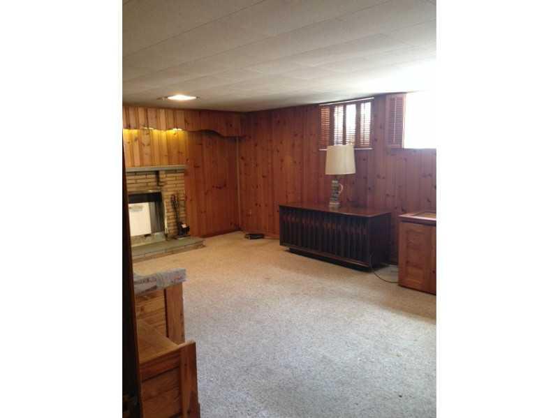 1235 Varner Road Whitehall, PA 15227 - Photo 14 of 18 Family Room. The window brings in sunlight.