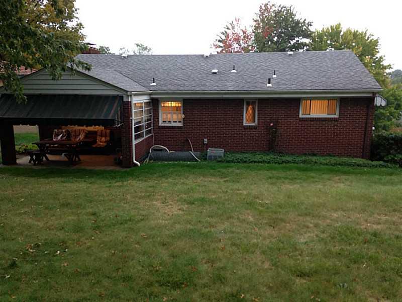 1235 Varner Road Whitehall, PA 15227 - Photo 17 of 18 Patio/Deck. The covered patio with awning is a great place to relax.