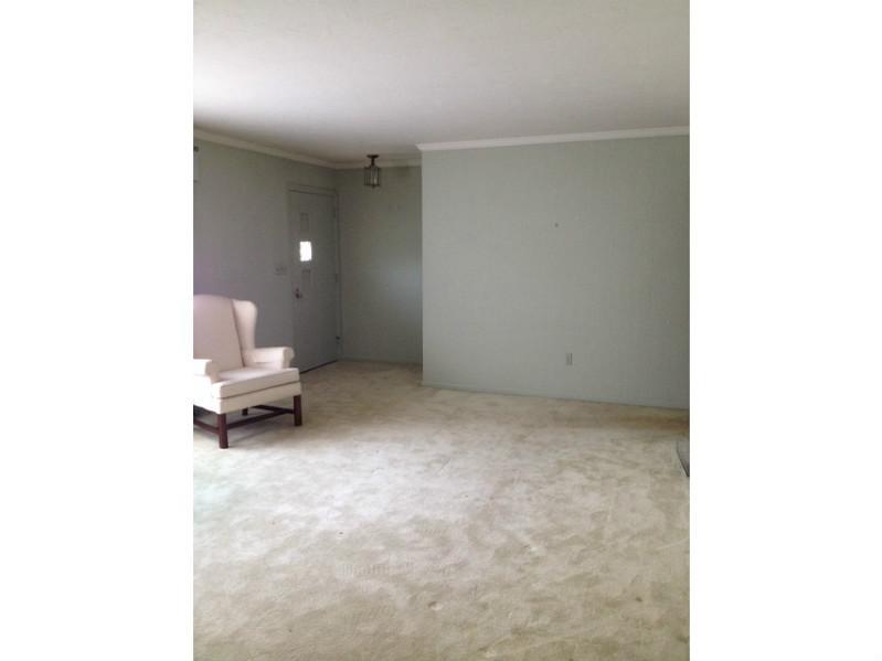 1235 Varner Road Whitehall, PA 15227 - Photo 3 of 18 Living Room. The large room affords space for your furniture.