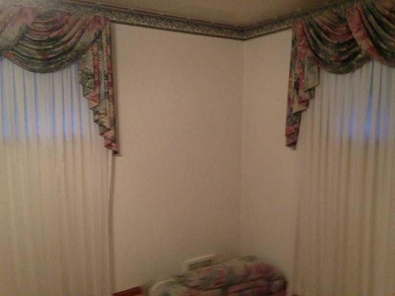 1235 Varner Road Whitehall, PA 15227 - Photo 10 of 18 Master Bedroom. This is a good sized bedroom with custom drapes with matching spread. There is a powder room, too.