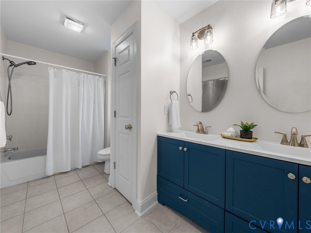 14335 Lander Road Midlothian, VA 23113 - Photo 46 of 70 a spacious bathroom with a double vanity sink mirror and toilet