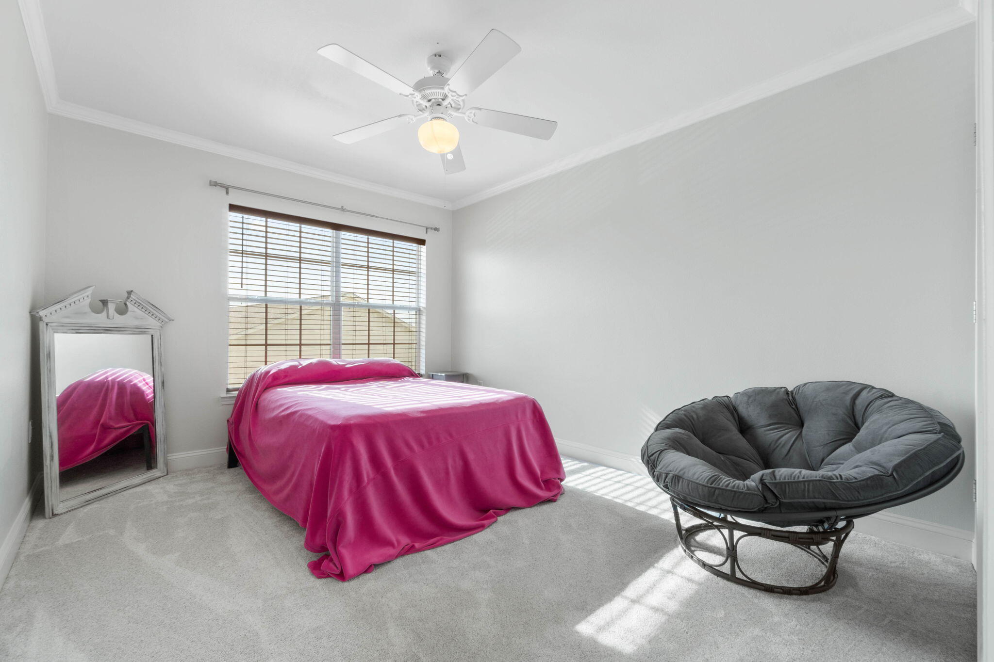 565 Wingspan Way Crestview, FL 32536 - Photo 21 of 39 a bedroom with bed and a couch