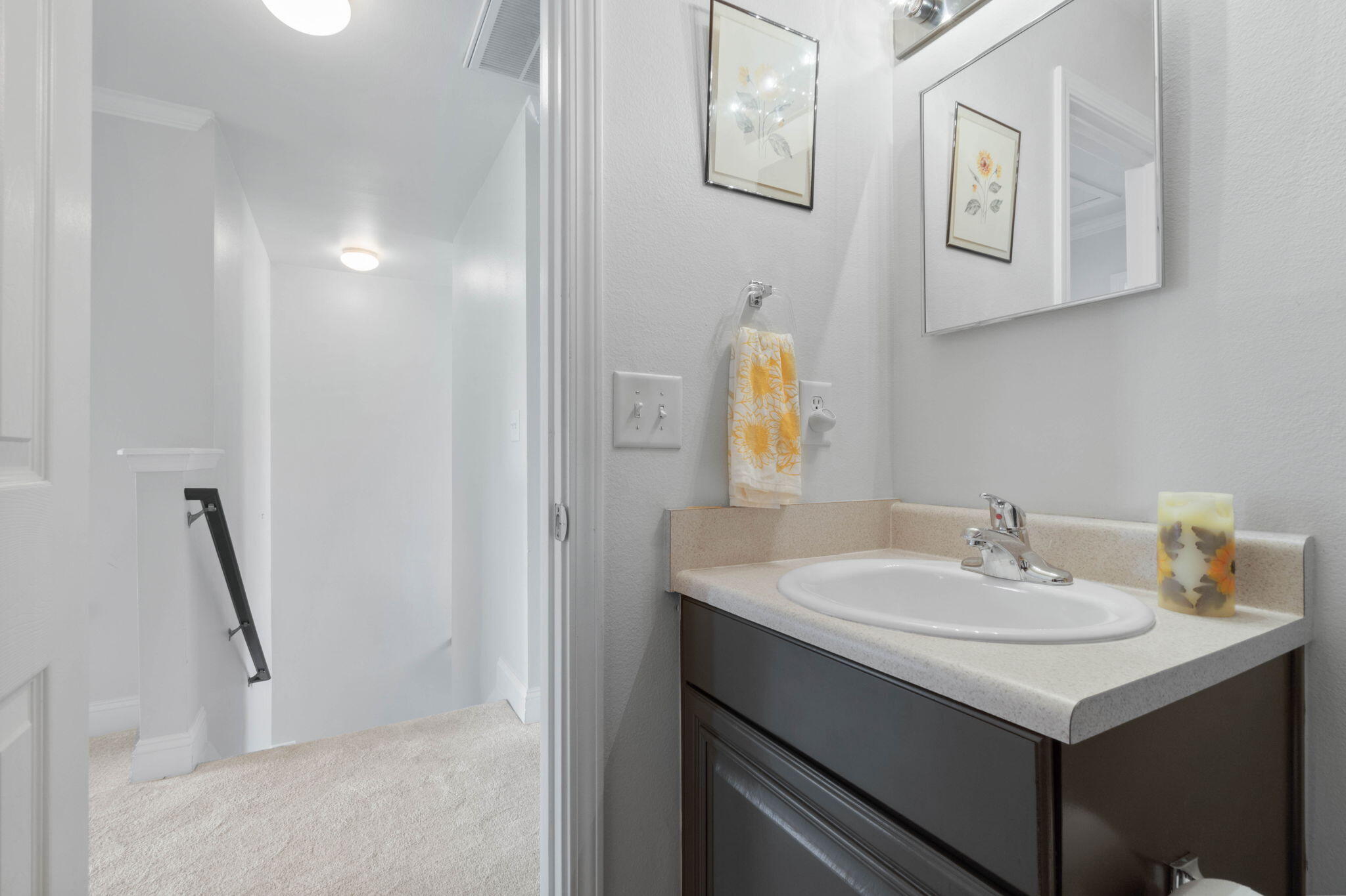 565 Wingspan Way Crestview, FL 32536 - Photo 24 of 39 a bathroom with a sink and a mirror