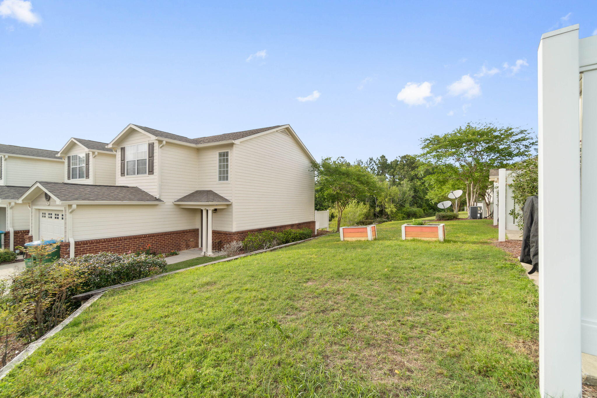 565 Wingspan Way Crestview, FL 32536 - Photo 32 of 39 a house view with a garden space