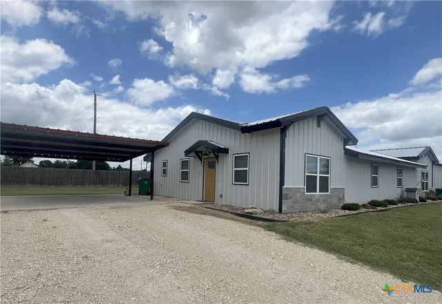 a front view of house with yard