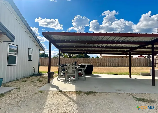 a car parked in front of a house