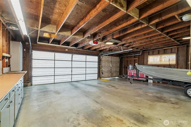 a view of a room with wooden walls