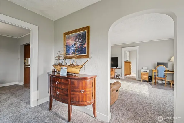 a workspace with furniture and window