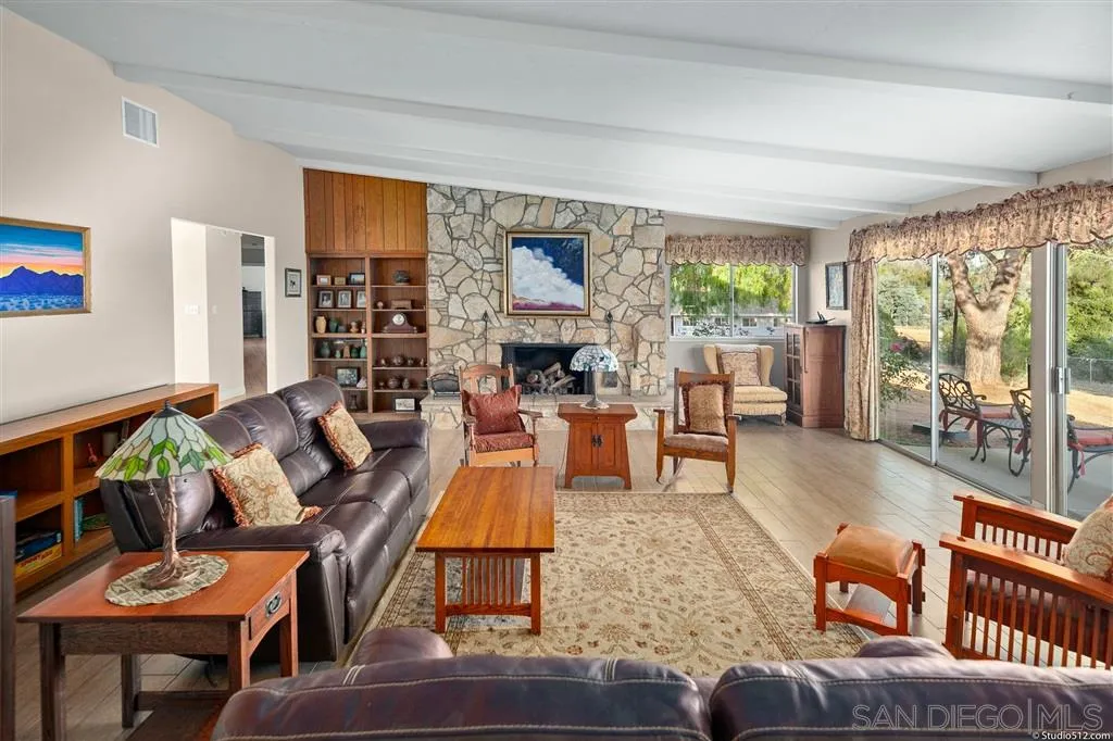 29760 Miller Road Valley Center, CA 92082 - Photo 9 of 25 a living room with furniture and a large window