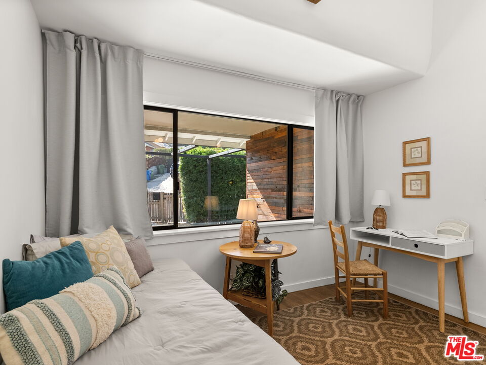 4707 Toland Way Los Angeles, CA 90042 - Photo 11 of 31 a living room with furniture and a large window