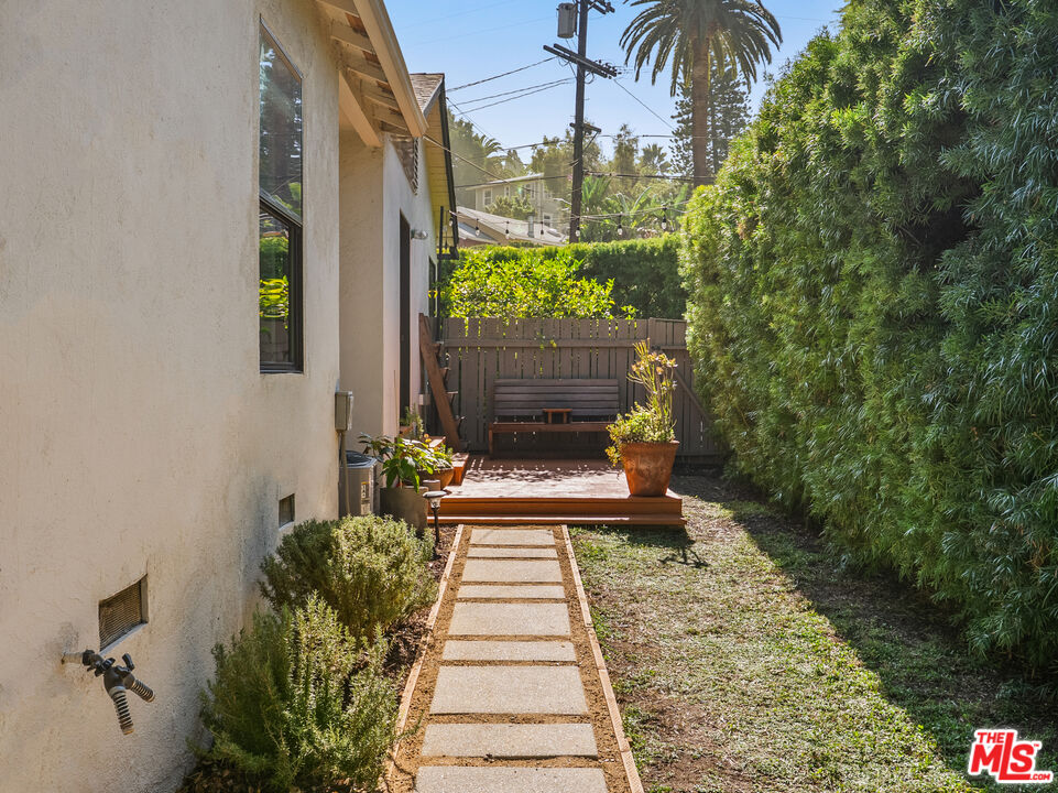 4707 Toland Way Los Angeles, CA 90042 - Photo 22 of 31 a view of a pathway both side of the house
