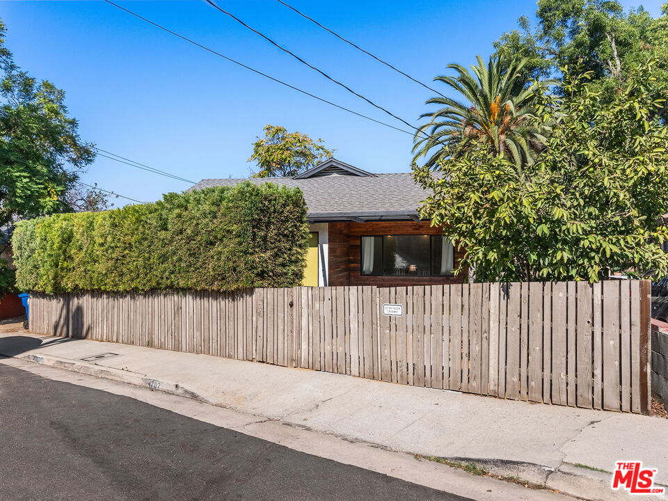 4707 Toland Way Los Angeles, CA 90042 - Photo 30 of 31 a front view of a house with a garden