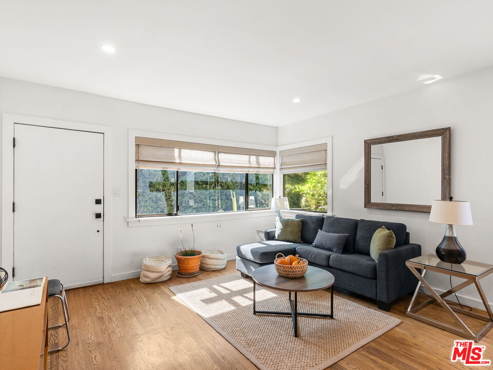4707 Toland Way Los Angeles, CA 90042 - Photo 4 of 31 a living room with furniture and a window
