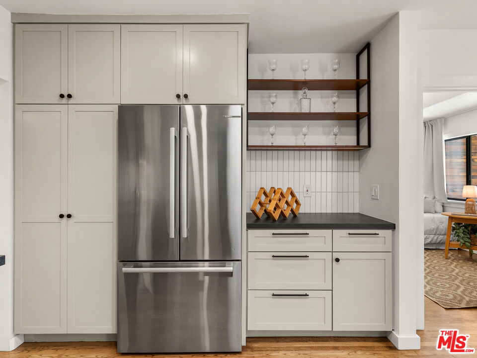 4707 Toland Way Los Angeles, CA 90042 - Photo 10 of 31 a kitchen with appliances and cabinets