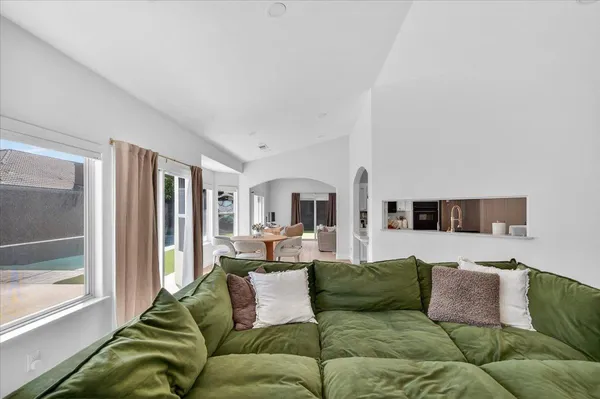 a bedroom with a bed and a table