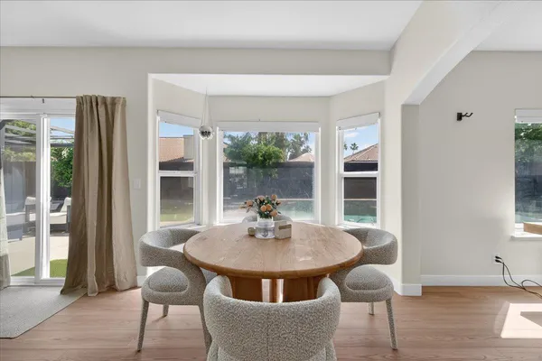 a bathroom with a double vanity sink mirror and