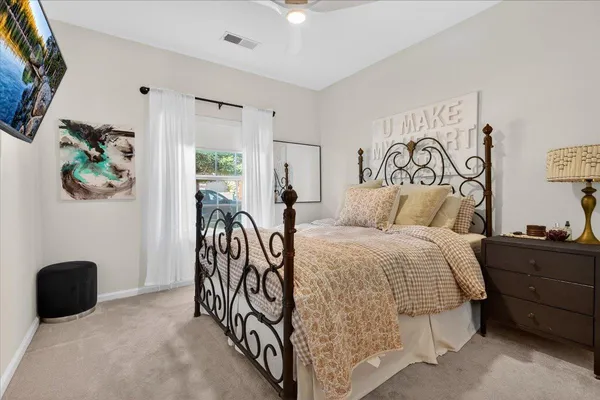 a view of a house with a yard porch and sitting area