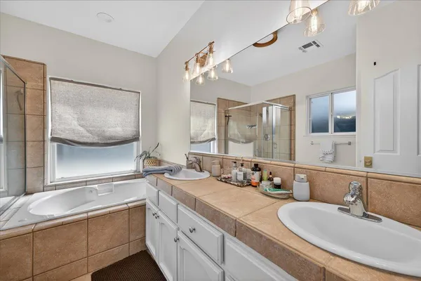 a view of a backyard with plants