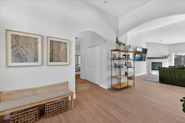 a view of an house with backyard and a tub
