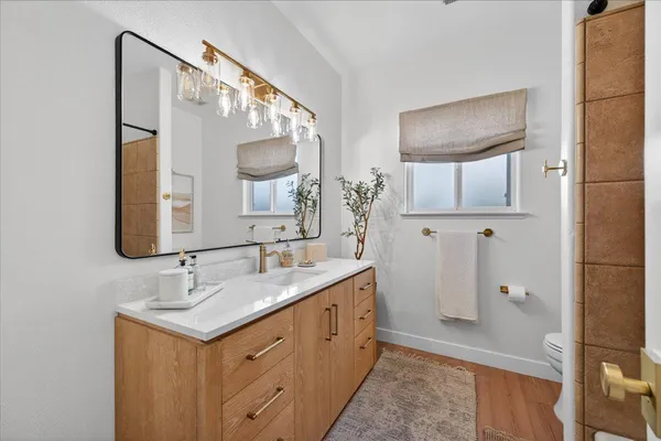 an aerial view of a house with a yard