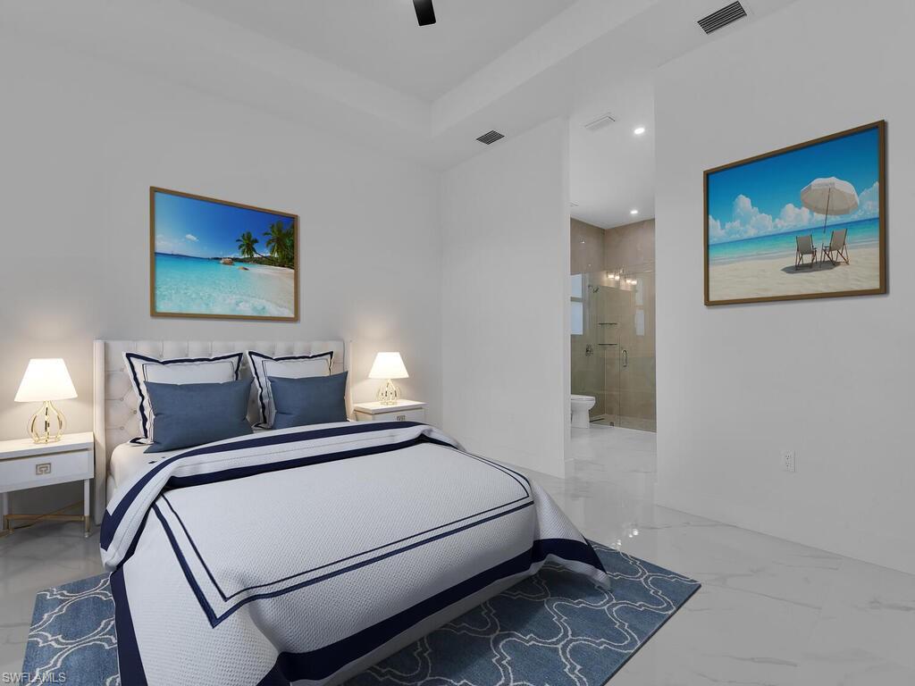 6108 Stratton Road Fort Myers, FL 33905 - Photo 14 of 27 Bedroom featuring marble finish floors, ensuite bath, and a ceiling fan