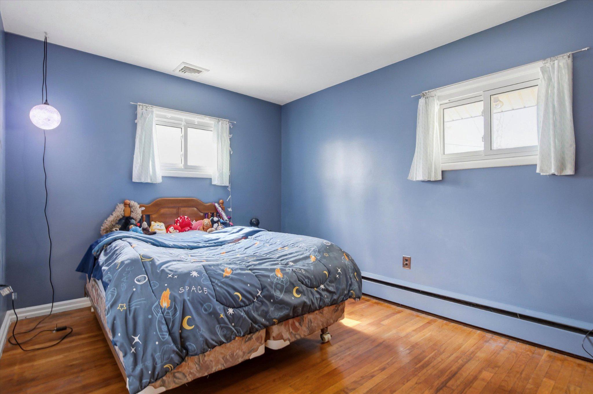 3386 Bristol Road Chalfont, PA 18914 - Photo 15 of 35 Cozy blue-hued bedroom retreat.