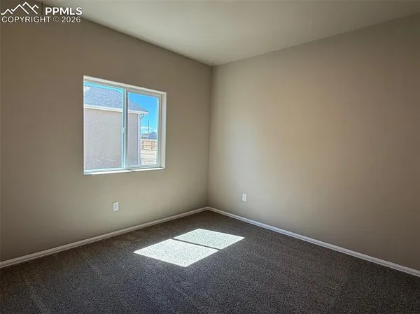 an empty room with closet