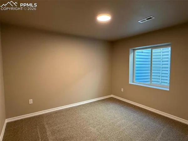an empty room with closet