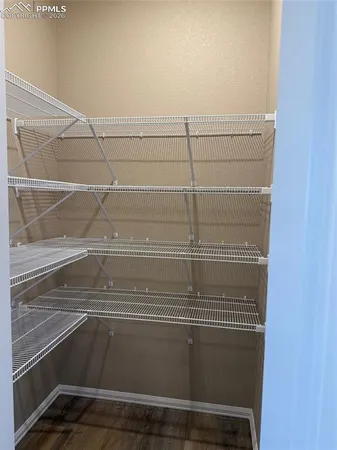 a view of a livingroom with wooden floor