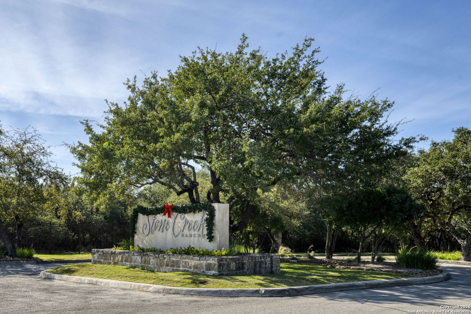 a view of a fountain in front of a house