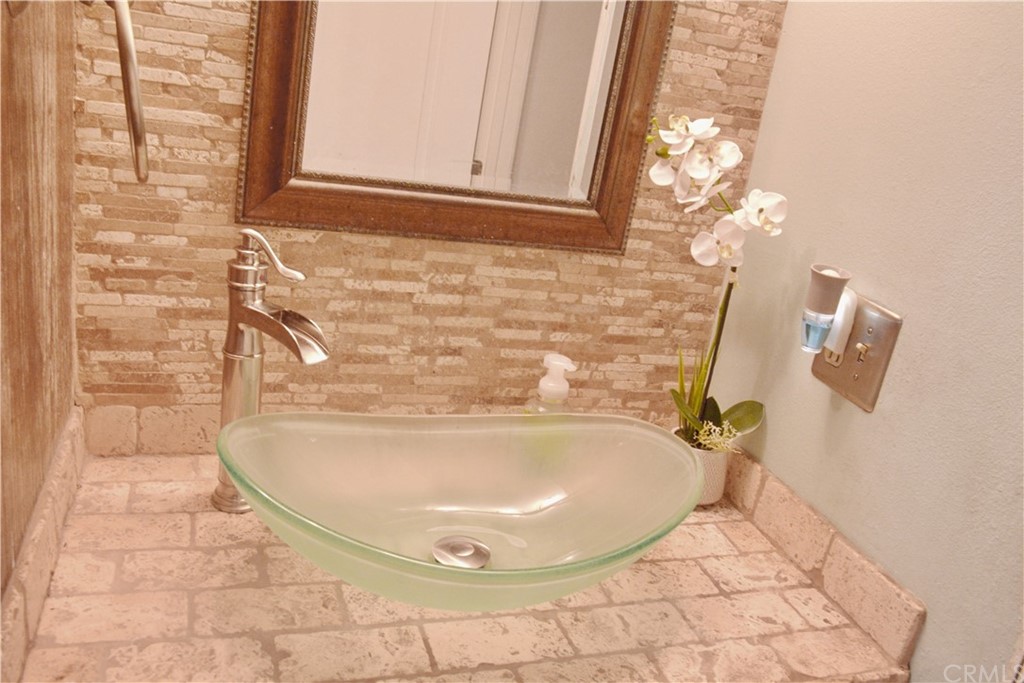 6038 KOA Drive Rialto, CA 92377 - Photo 12 of 18 a bathroom with a sink